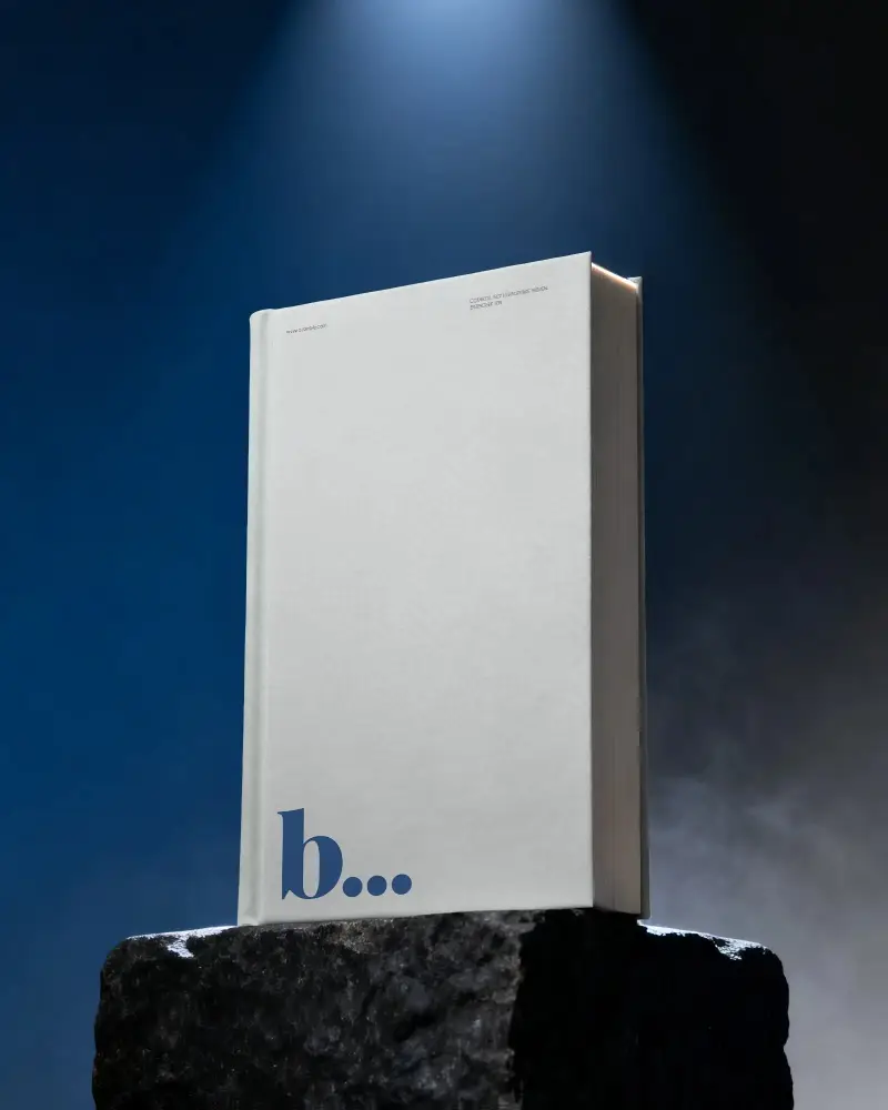 Hardcover Book Mockup Standing On Stone Platform With Soft Shadow And Light