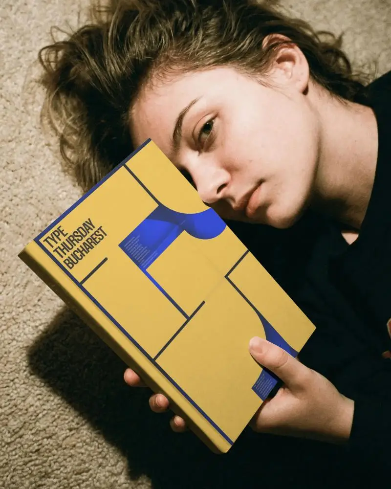 Person Holding Hardcover Book Mockup For Personalized Publishing And Book Design