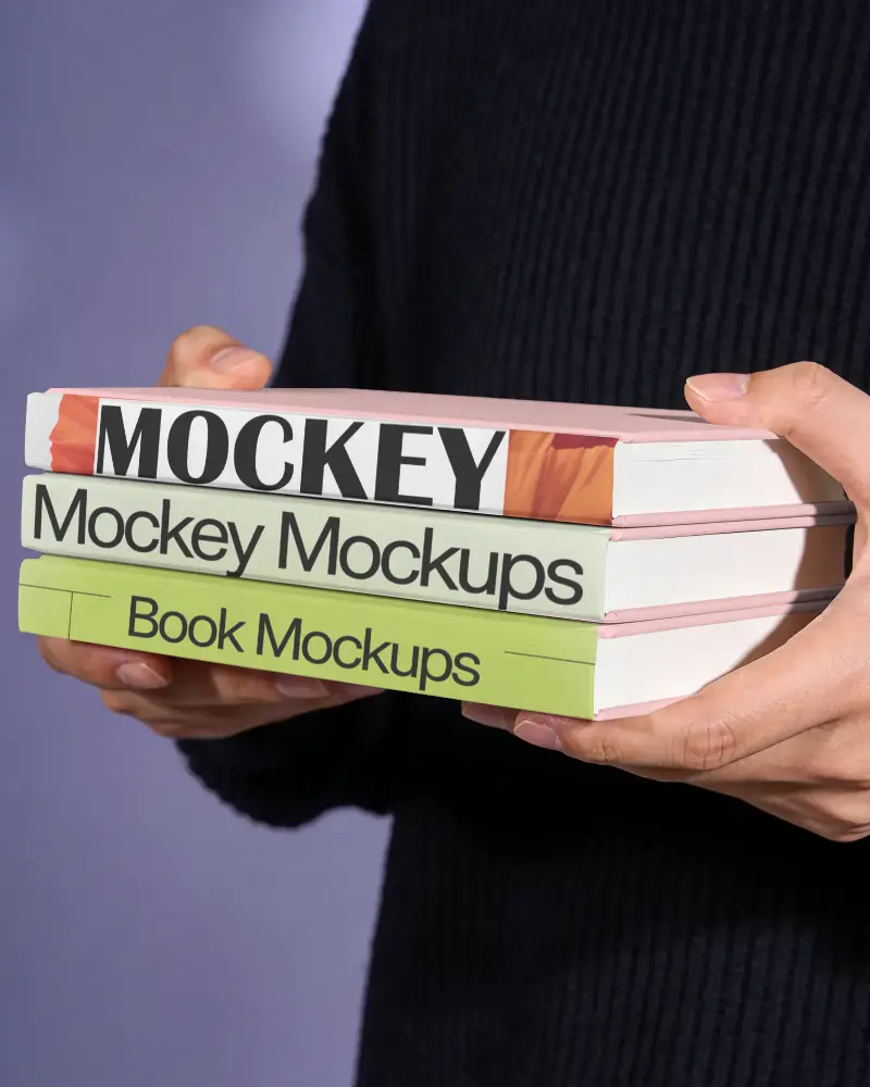 Person Holding Stack Of Thick Hardcover Books Mockup With Blank Grey Covers In Hands
