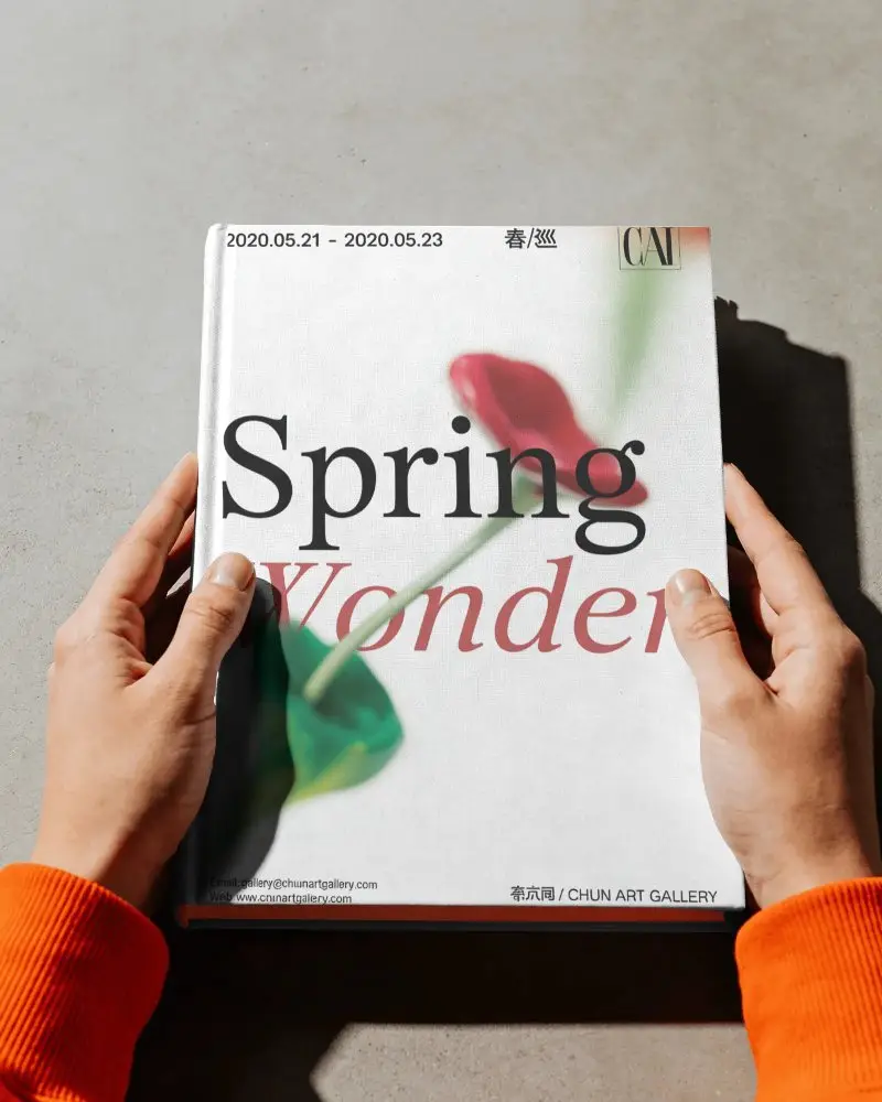 Hands Holding Blank Hardcover Book Mockup For Custom Book Design Presentations