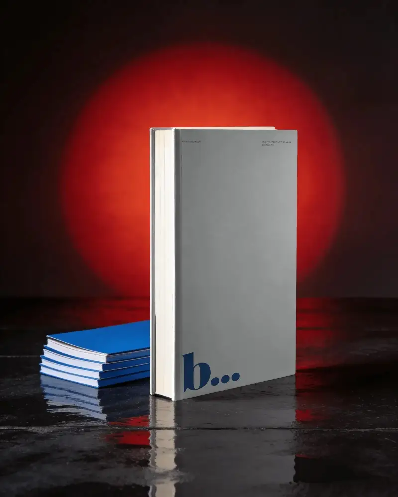Hardcover Book Display With Minimalist Cover Design Against Vibrant Backdrop For Showcase