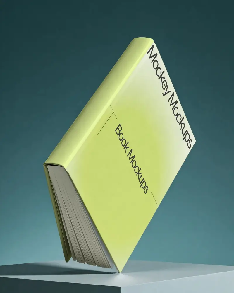 Hardcover Book Mockup Floating Over Minimalist Surface Studio Background