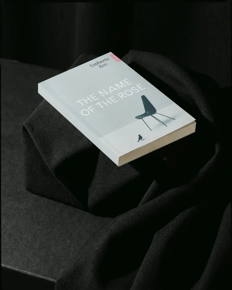 Minimalist Softcover Book Mockup On Textured Blackfabric For Modern Bookdesign Presentation