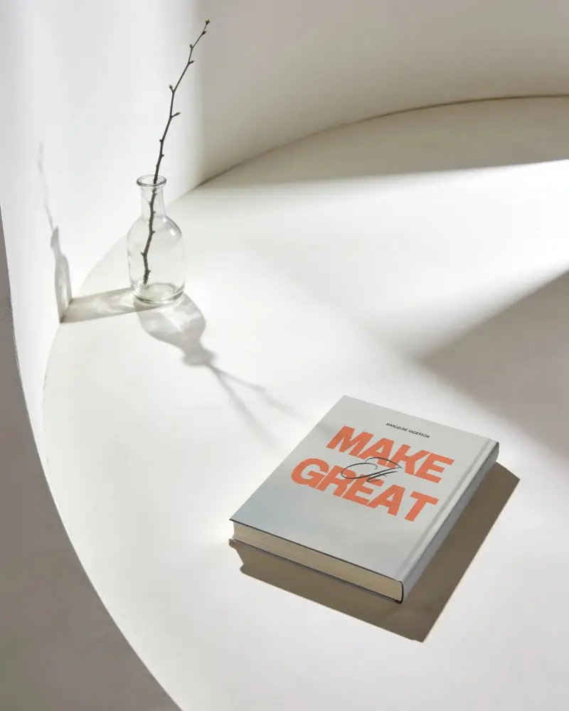 Minimalistic Hardcover Book Mockup On Curved White Background With Soft Shadow Play