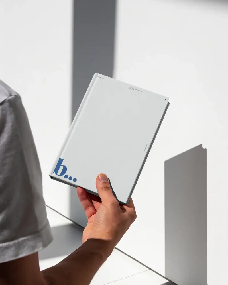 Minimal Handheld Book Mockup With Shadow For Clean Portfolios And Presentations