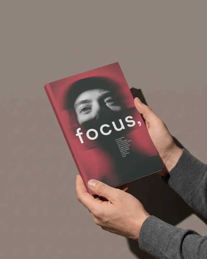 Close Up Of Hands Presenting A Simple Book Mockup For Branding Purposes