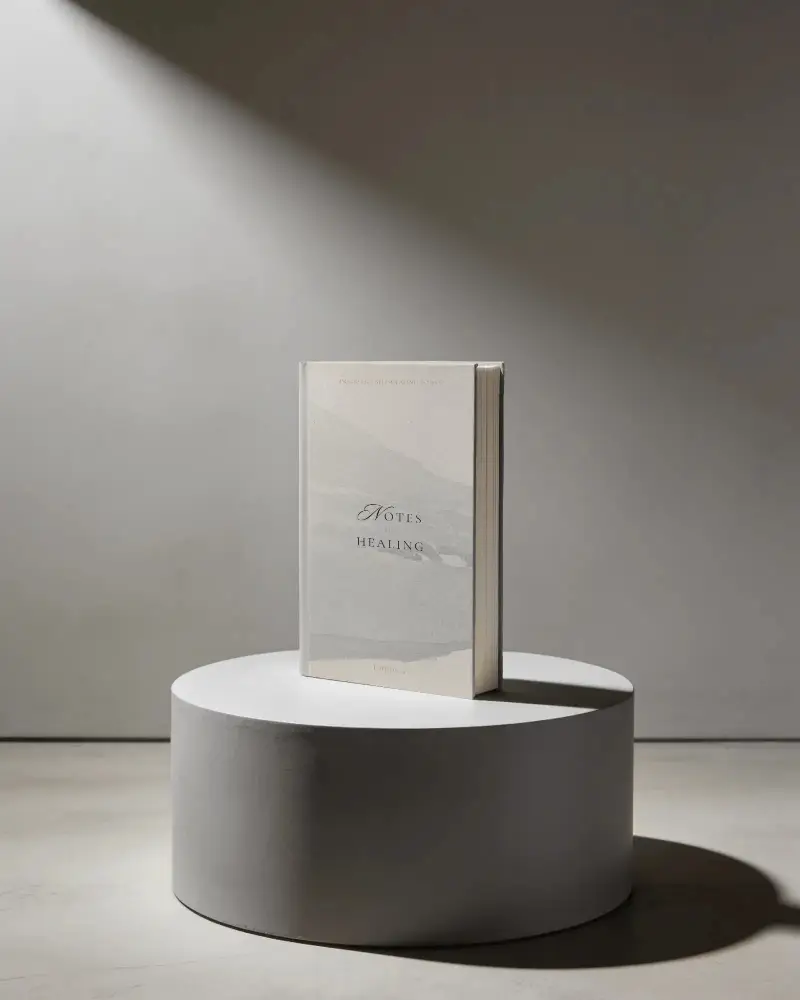 Hardcover Book Mockup On Minimalist Round Podium With Soft Shadow Lighting Studio