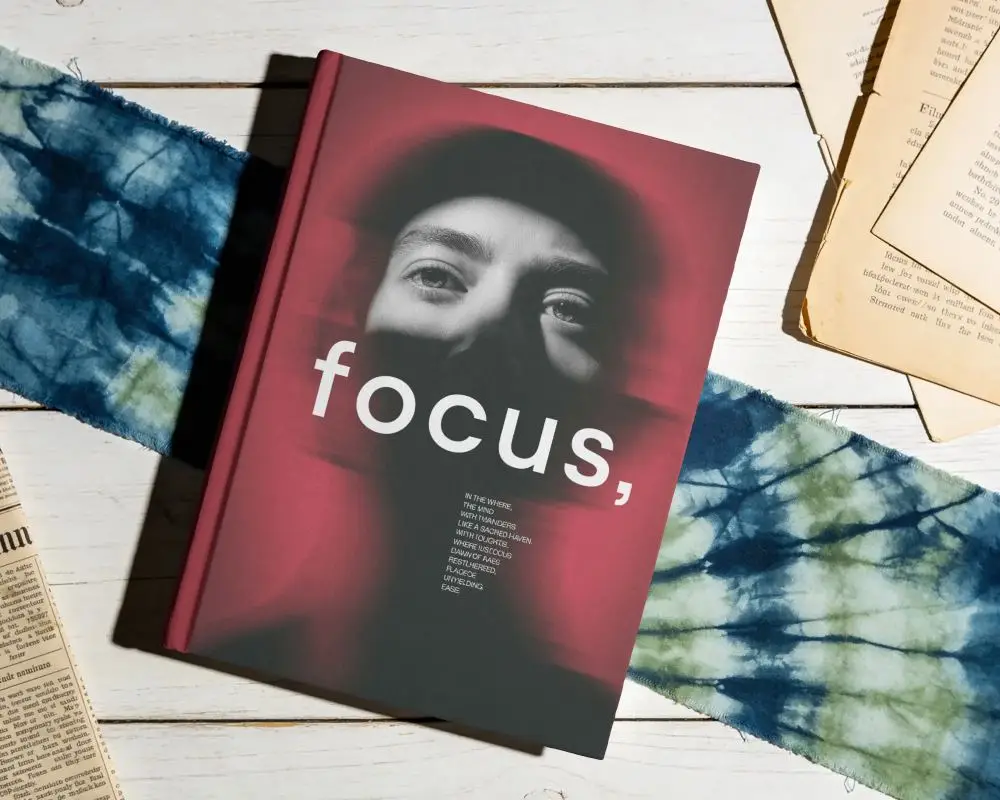 Plain Hardcover Book Mockup On Wooden Surface With Fabric And Old Pages