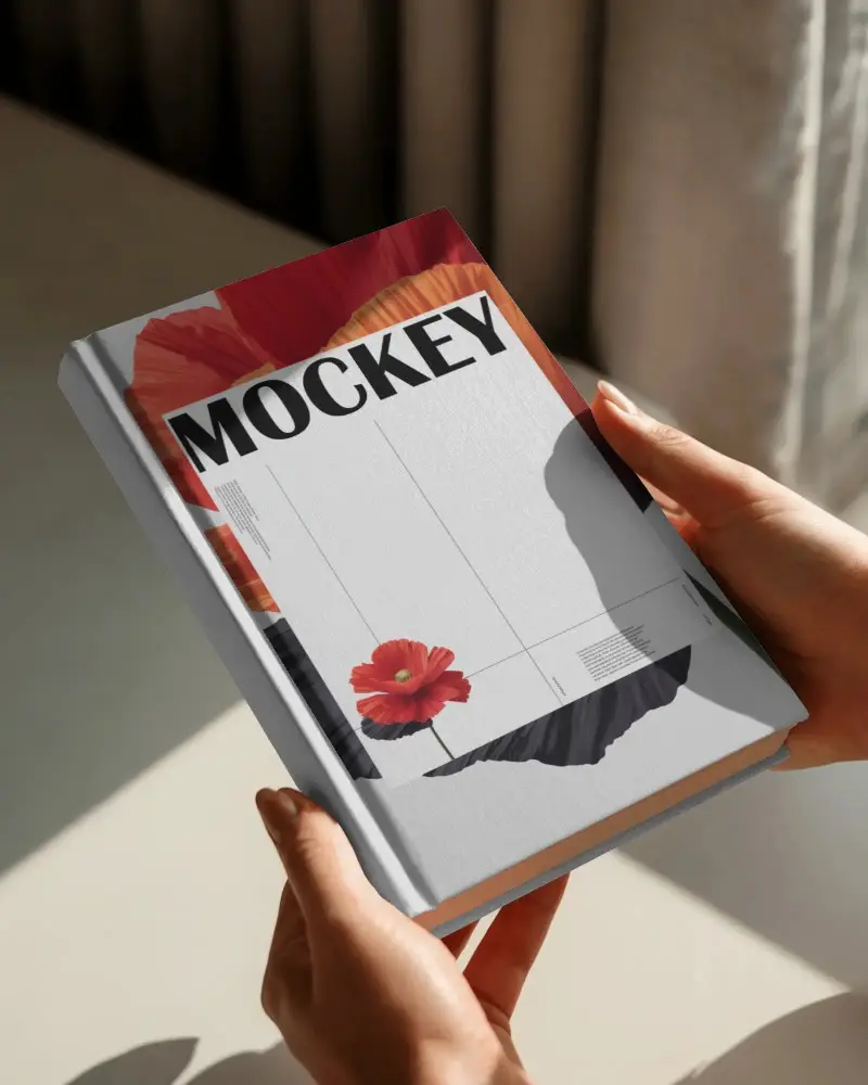 Natural Sunlight Book Mockup Hands Holding Hardcover In Soft Morning Light On Minimal Surface