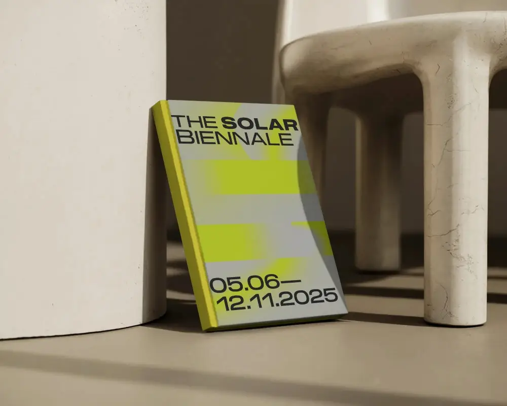 Minimal Book Cover Mockup Against Modern Objects Leaning On Sculptural Furniture In Studio Setting