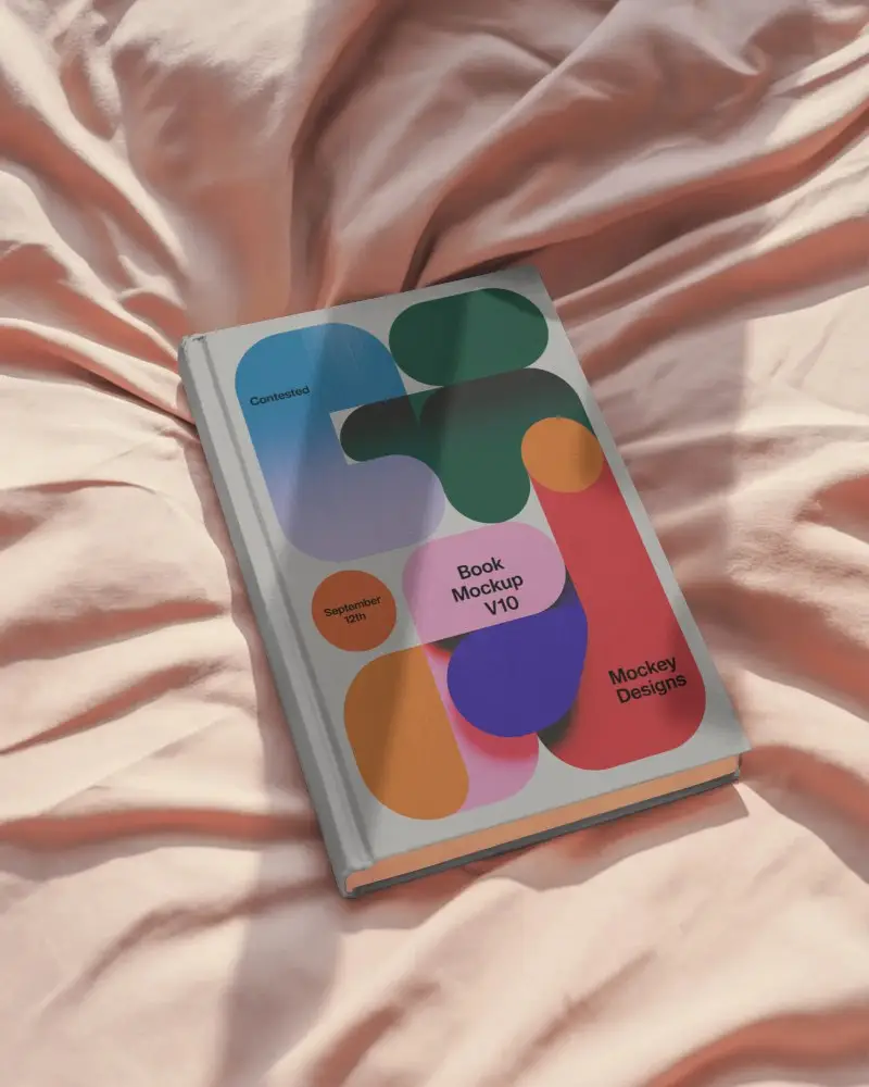 Hardcover Book Mockup On Soft Fabric Background For Professional Publishing Presentations