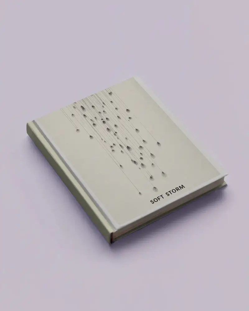 Book Mockup Angled Top View Grey Hardcover On Pastel Purple Surface Soft Lighting Clean Minimal Editorial Style