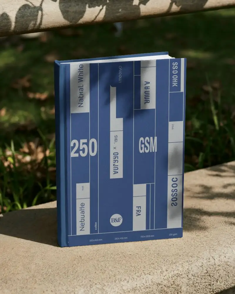 Standing Book Mockup On Stone Bench With Dappled Light Filtered Through Outdoor Leafy Shade Scene