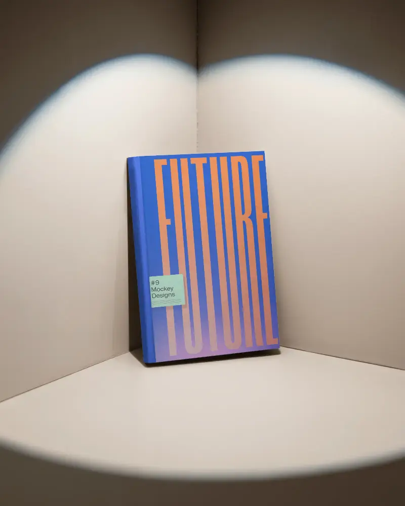 Spotlit Corner Book Mockup Standing Against Beige Wall Soft Shadow And Studio Lighting