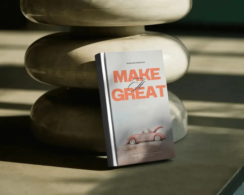 leaning-book-mockup-against-stone-sculpture-with-sunlight-and-organic-shadow-play