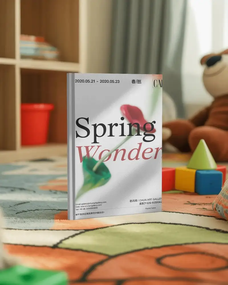 playroom-book-mockup-on-colorful-rug-with-toys-in-background-and-sunlight-through-window