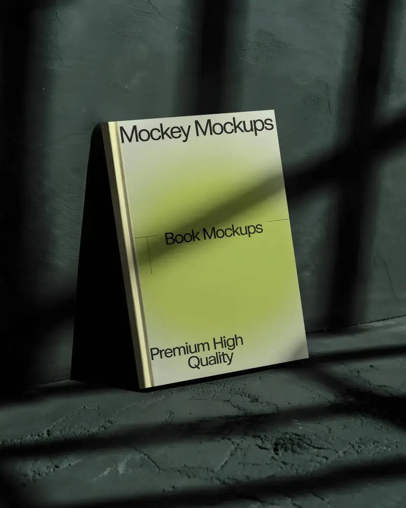 hardcover-book-mockup-with-shadow-play-on-textured-background-for-design-presentation