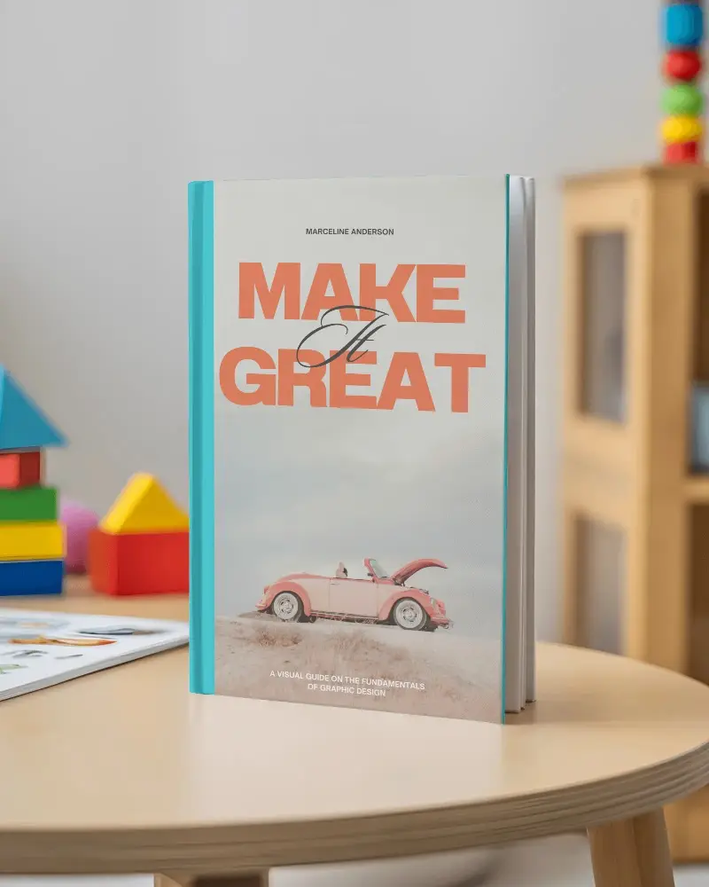 hardcover-book-mockup-blank-front-cover-on-wooden-table-kids-educational-toys-background