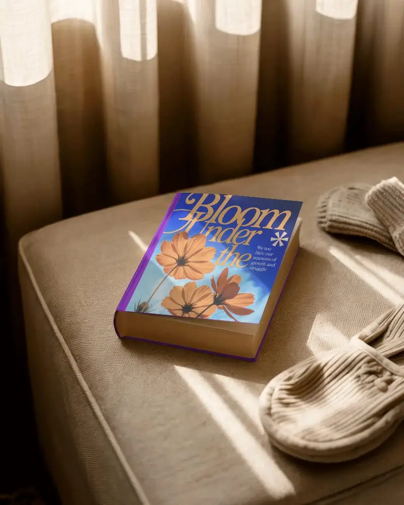 hardcover-book-mockup-with-sunlight-shadow-on-fabric-sofa-for-reading-concept