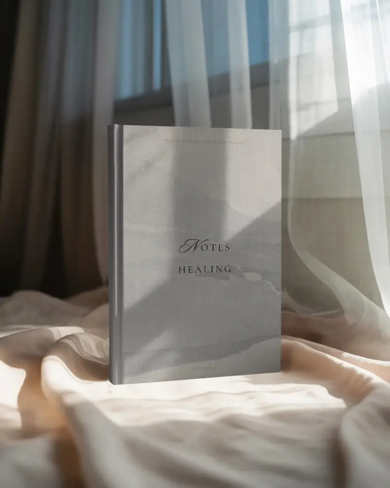 Elegant Hardcover Book Mockup On Soft Fabric With Natural Light And Window Background