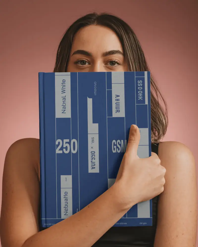 Close Up Of Young Woman Hugging Book Mockup With Blank Front Cover For Design