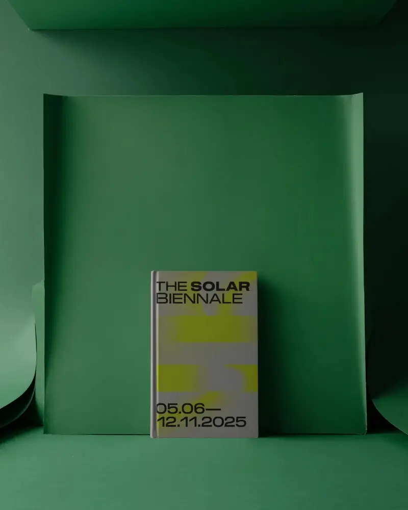 Hardcover Book Mockup Standing In Monochrome Green Paper Studio Set