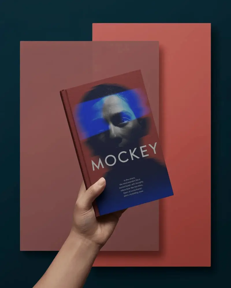 Modern Hand Held Book Mockup With Overlapping Color Panel Background