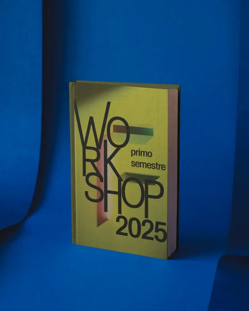 Hardcover Book Mockup Standing On Deep Blue Paper Backdrop With Curved Folded Walls