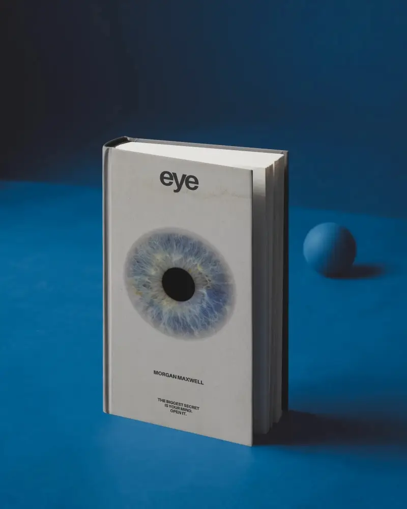 Hardcover Book Mockup Standing On Deep Blue Studio Surface With Minimal Sphere Prop