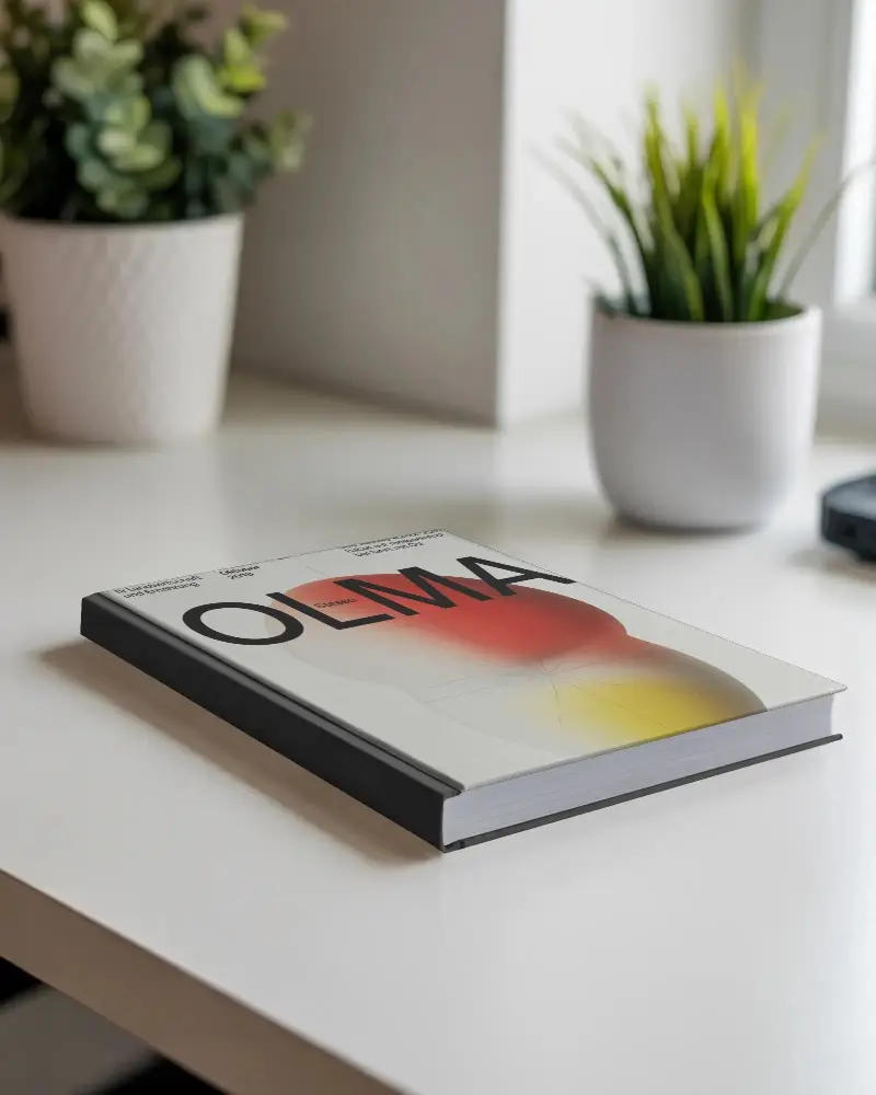 Hardcover Book Mockup On Minimalist Desk With Green Indoor Plants Background