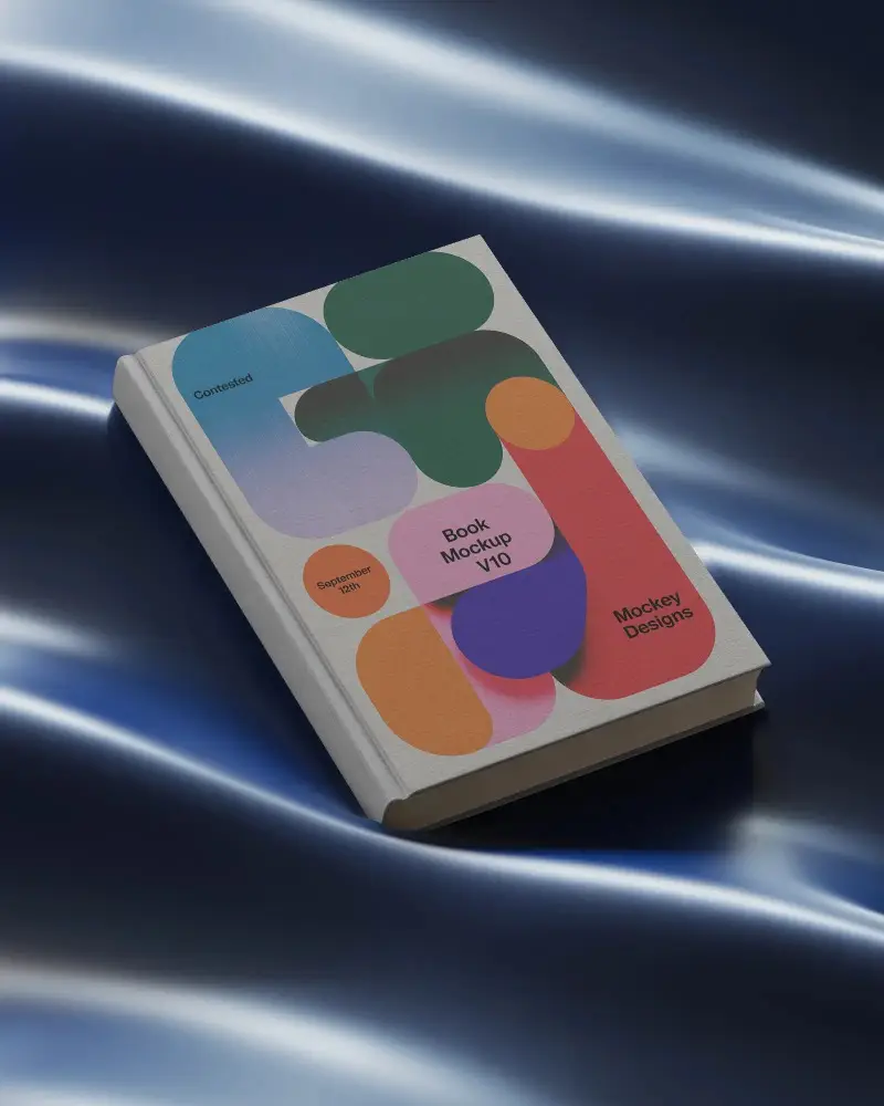 Hardcover Book Mockup On Sleek Glossy Satin Fabric Background Perfect For Publishing