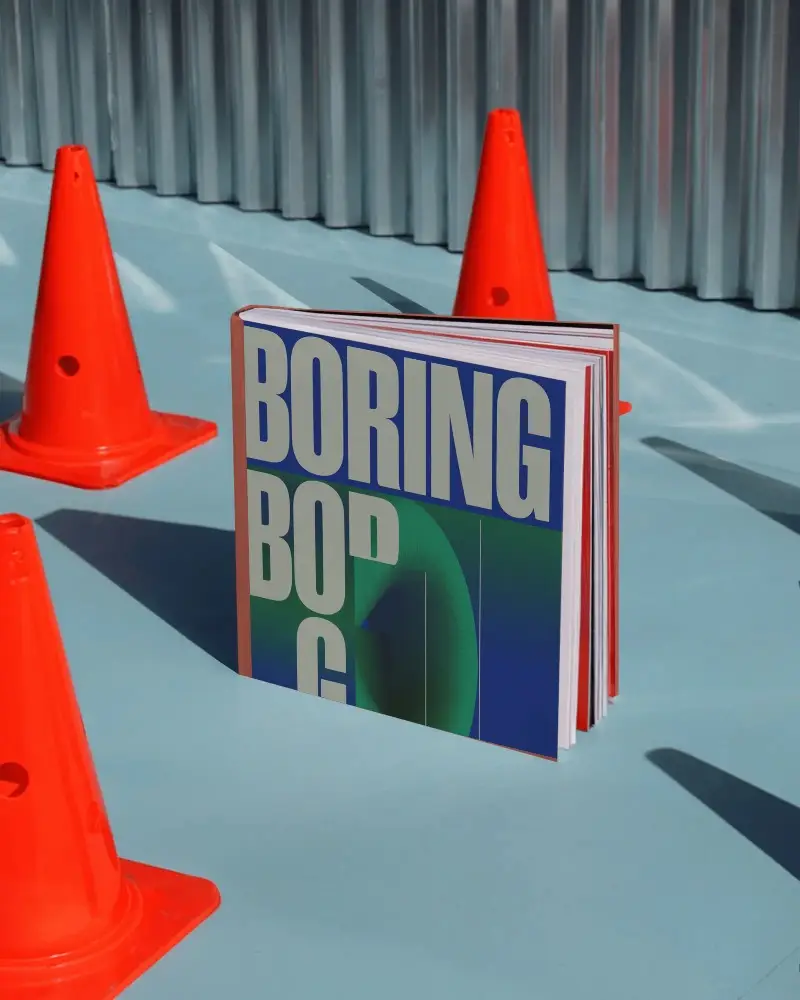 Urban Book Mockup With Minimalist Design And Modern Traffic Cone Background