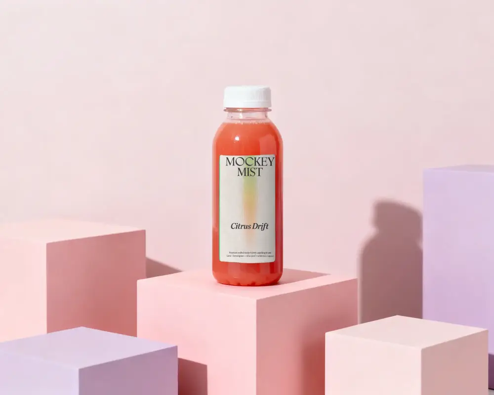 Clear Plastic Bottle Mockup For Beverage Packaging Design Presentation Podium