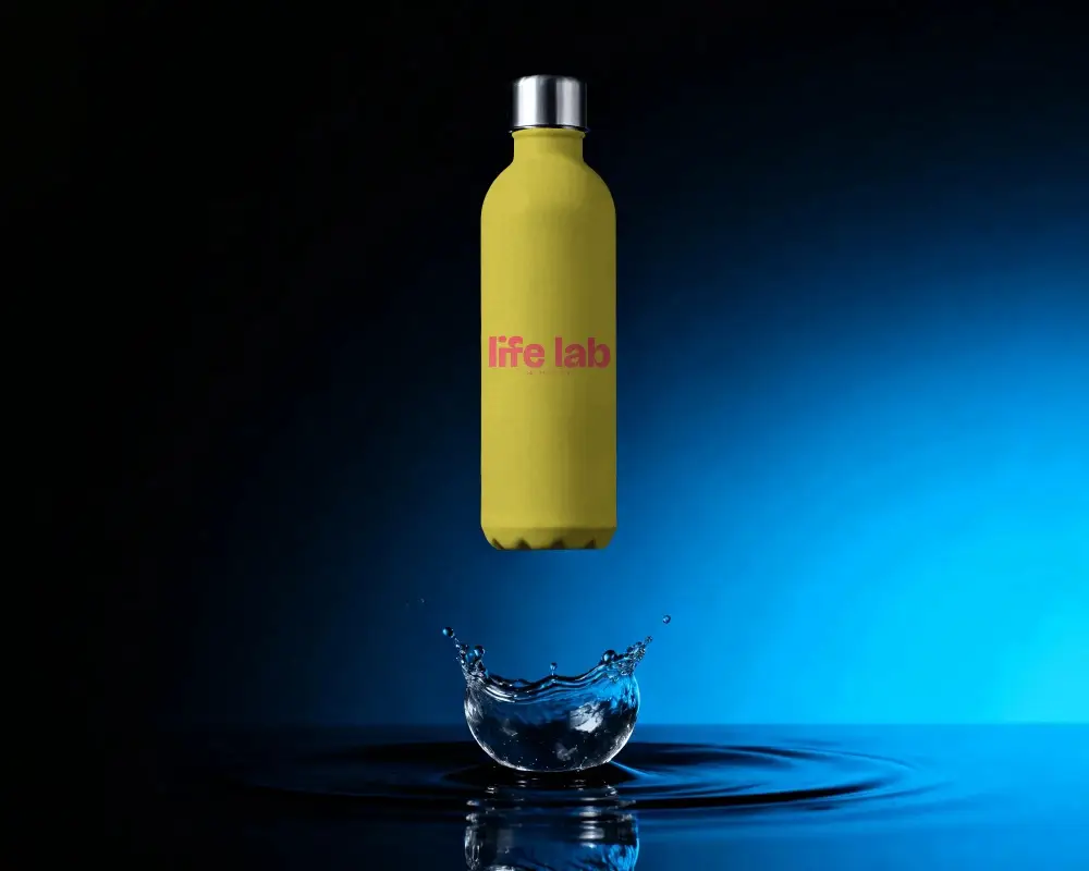 Sleek Water Bottle Mockup Floating Above Splash For Modern Product Presentation
