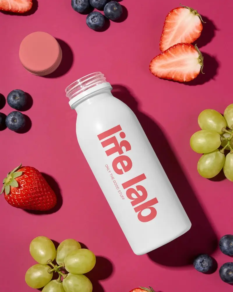 Clean Minimalist Bottle Mockup With Fruit Layout For Healthy Drink Brand