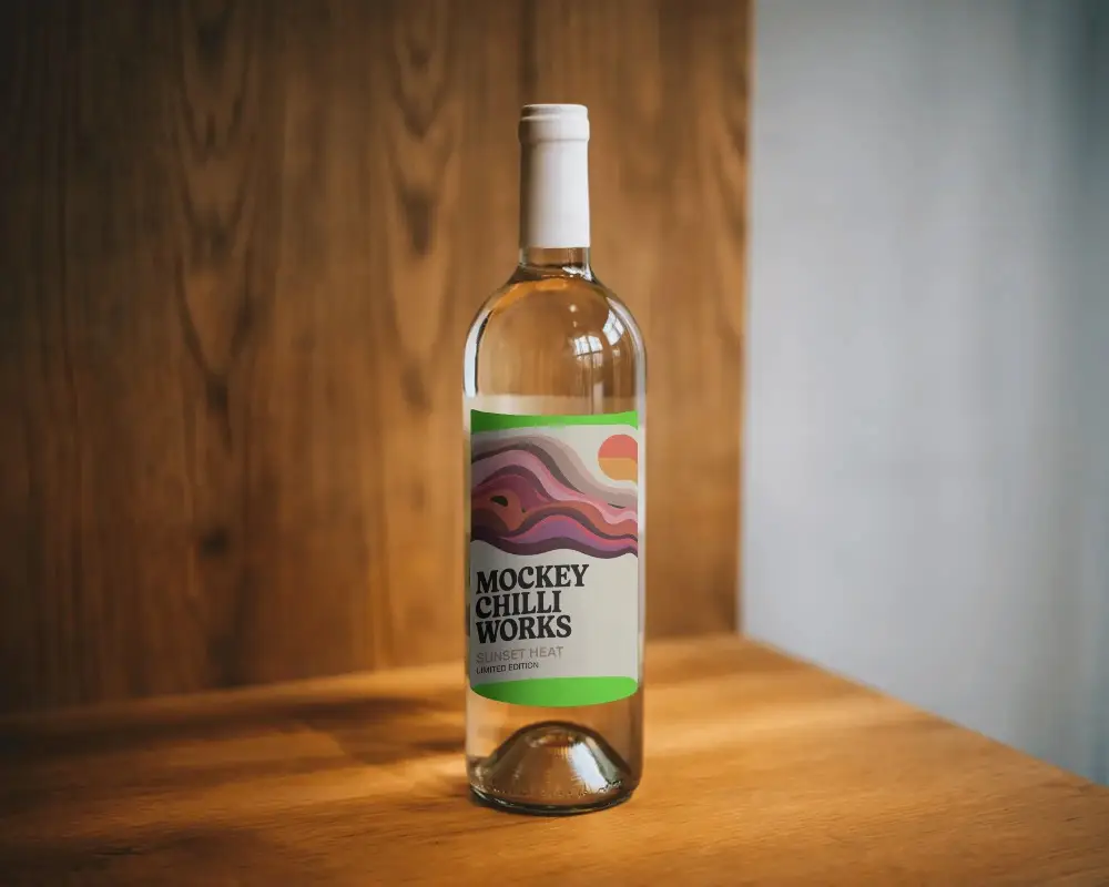 Clear Glass Wine Bottle Mockup With Blank Label Perfect For Branding And Packaging Designs