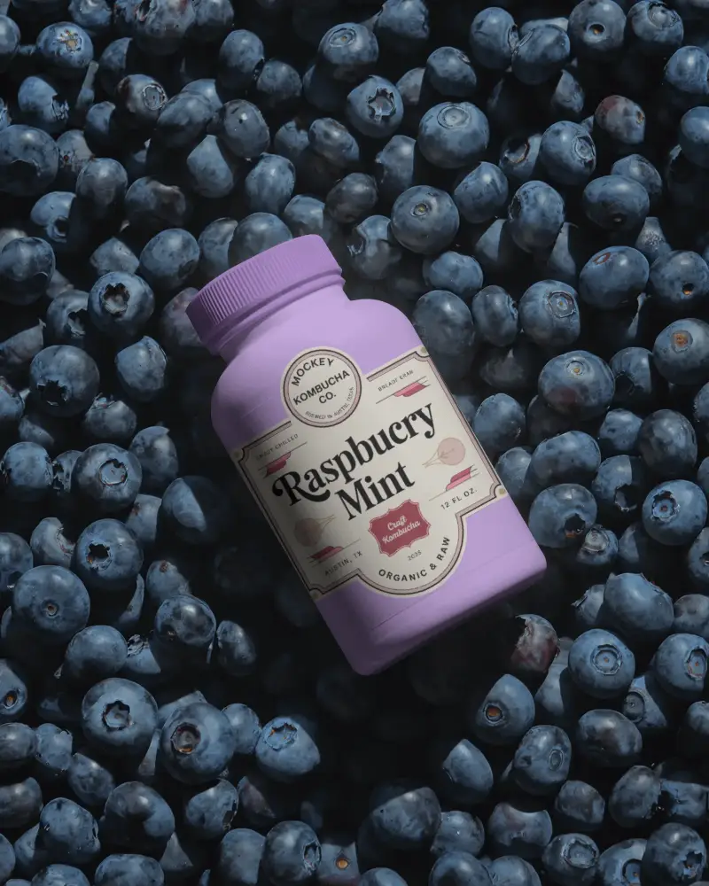 Empty Nutrition Supplement Bottle Mockup Floating Above Fresh Berry Background