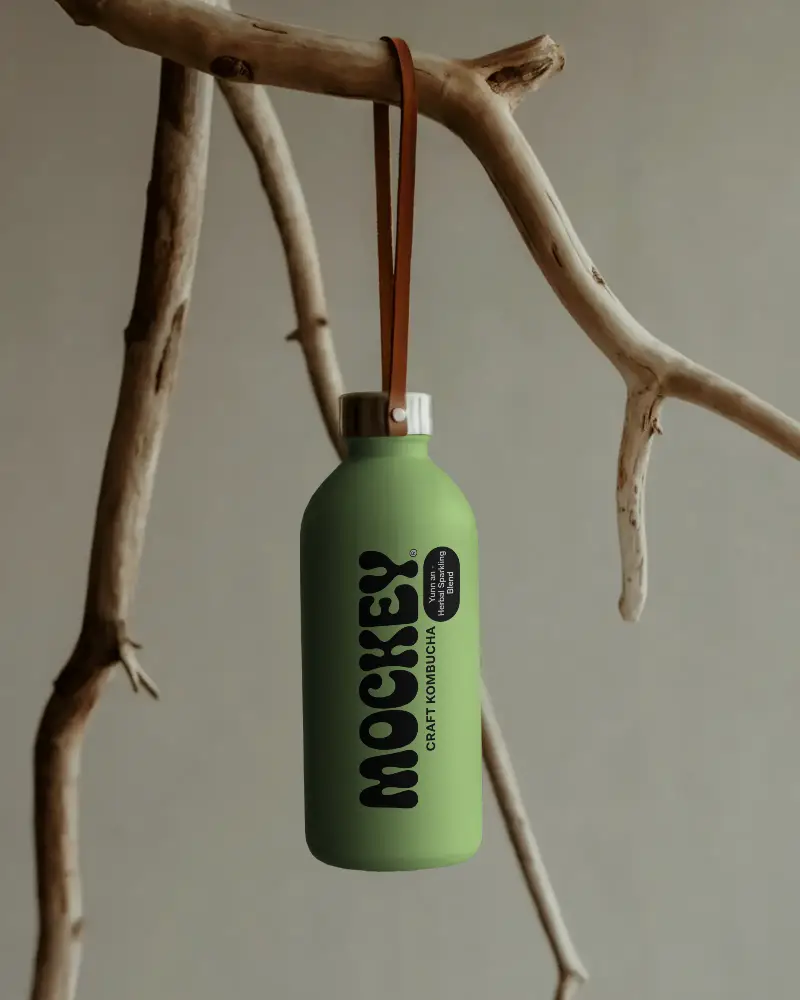 Reusable Water Bottle Mockup With Leather Strap Hanging On Natural Wood Branch Display