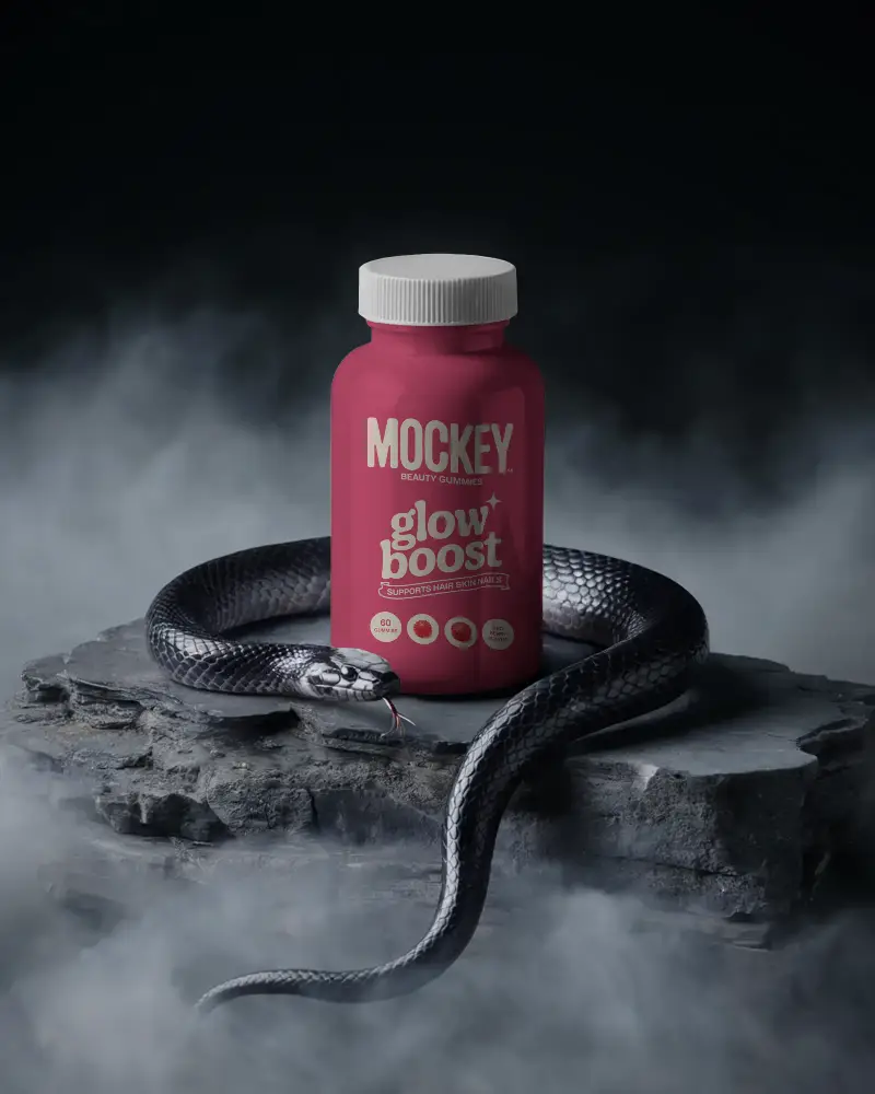 Blank Supplement Bottle Mockup With Snakeskin Texture Snake Coiled Around On Rocky Base