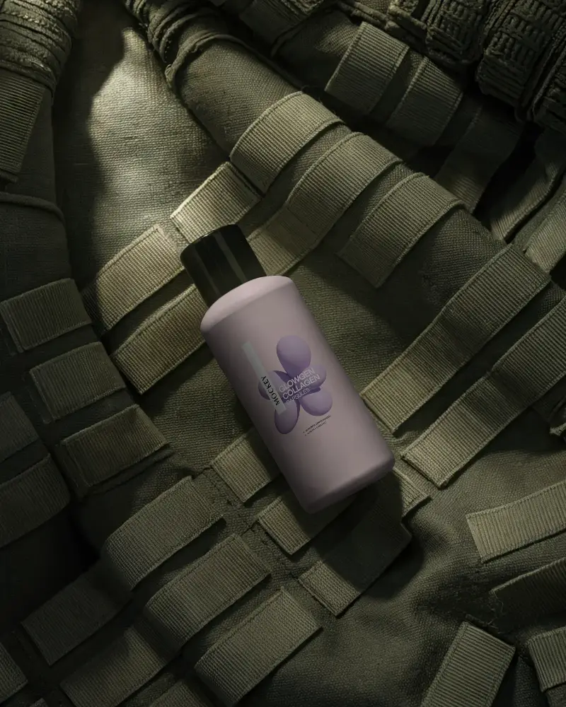 Sleek Matte Finish Bottle Mockup On Tactical Gear Background For Military Product Packaging