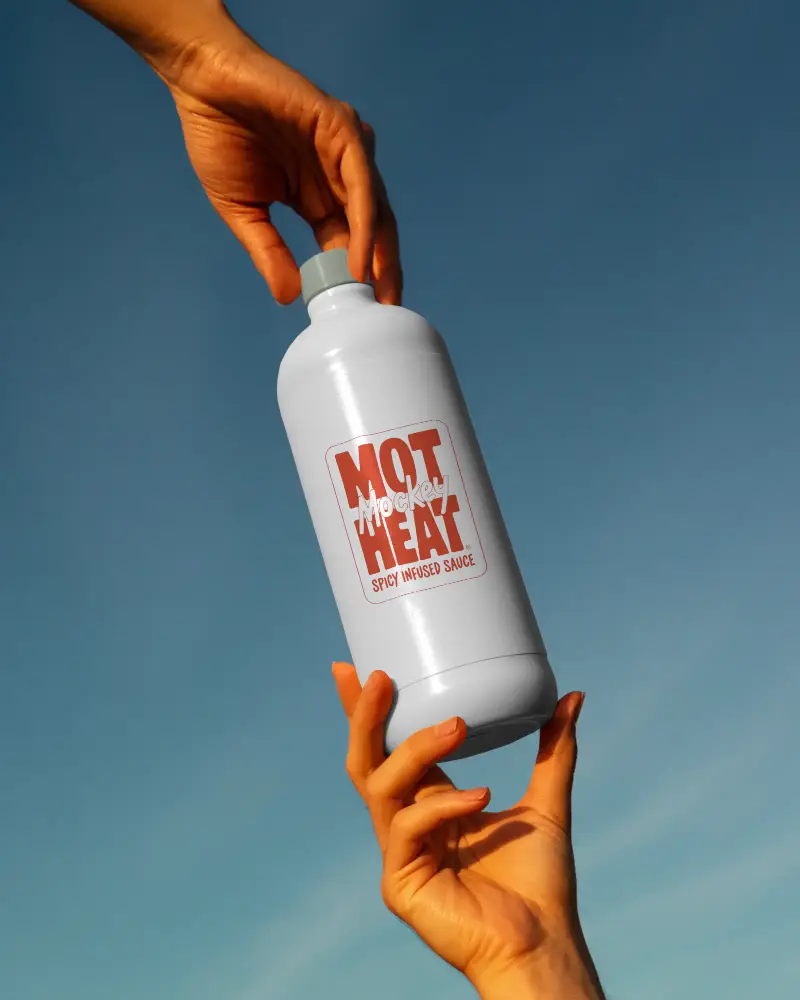 Realistic Empty Bottle Mockup In Hand With Smooth Surface For Custom Design Display