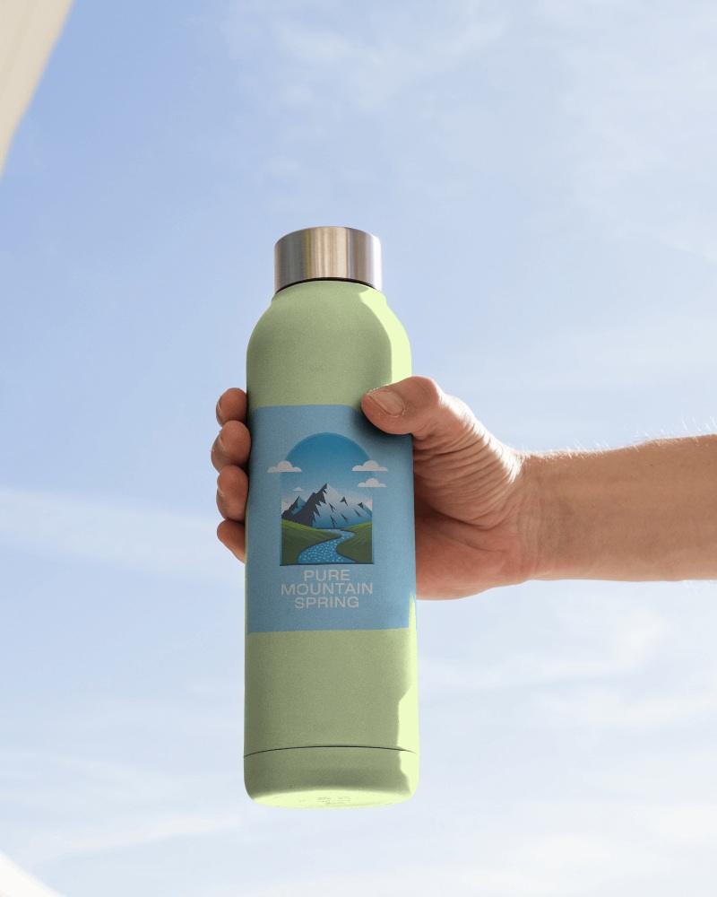 Present Your Designs In Style With A Blue Bottle Mockup That Highlights Vibrant Color And Clarity