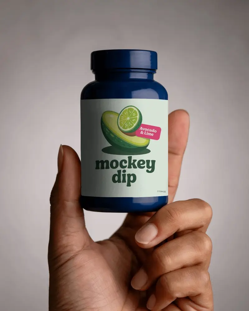Hand Holding Premium Quality Supplement Bottle Mockup For Branding And Label Design