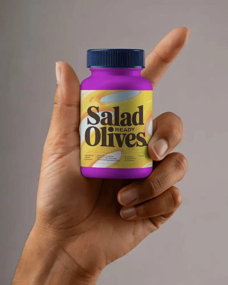 Hand Holding Small Pill Bottle Mockup For Healthcare And Pharmaceutical Packaging Design