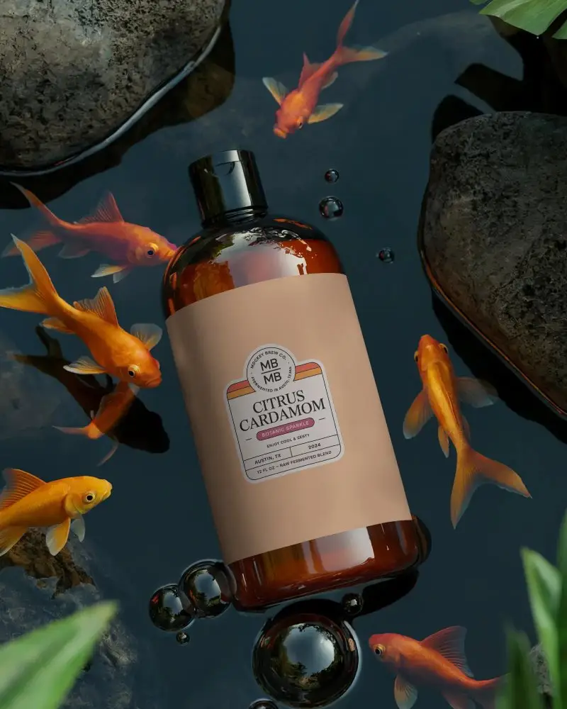 Amber Bottle Mockup Floating In Water With Goldfish Surrounding Stylish Packaging Design