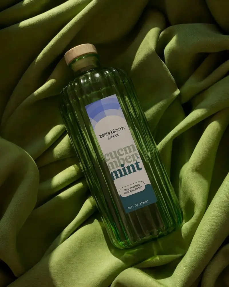 Premium Clear Ridged Bottle Mockup With Natural Wood Cap On Textured Fabric Background