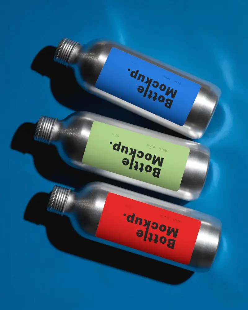 Top View Metal Water Bottle Mockup Set On Blue Background With Sharp Shadow Depth