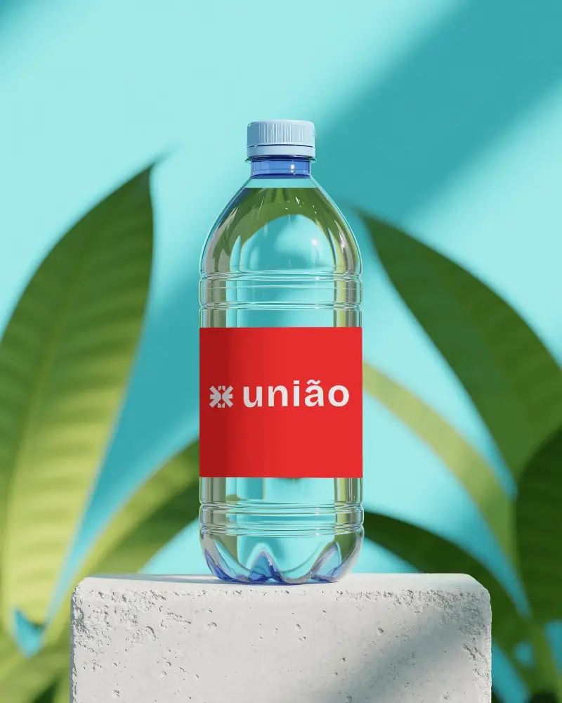Tropical Water Bottle Mockup On Textured Pedestal With Bright Sky Background