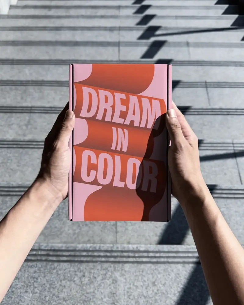 Hands Holding Rectangular Cardboard Box Mockup On Urban Stairs Background