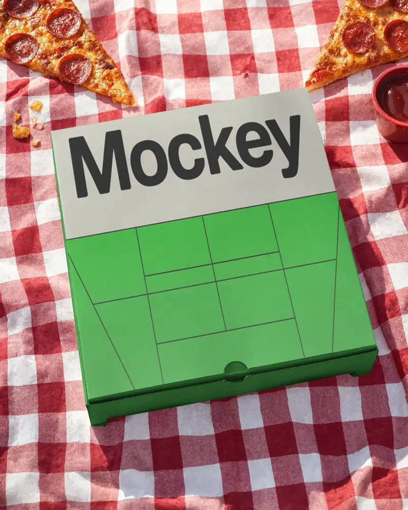 Blank Pizza Box Mockup For Custom Designs And Branding On Checkered Tablecloth
